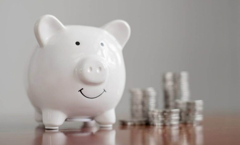 piggy bank with golden coins pile, step up growing business to success, and saving for retirement