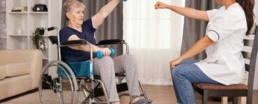 Invalid old woman training her arms