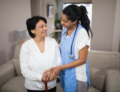 Young nurse standing with patient